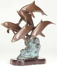 Brass Dolphin Family On Wood